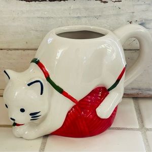Wondershop kitty on a ball of yarn ceramic mug